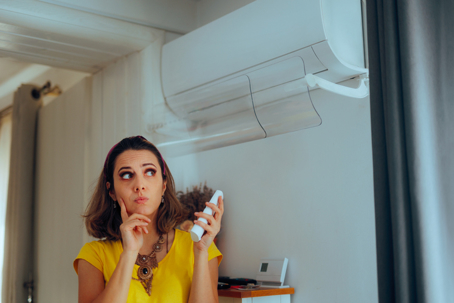 woman thinking about AC system